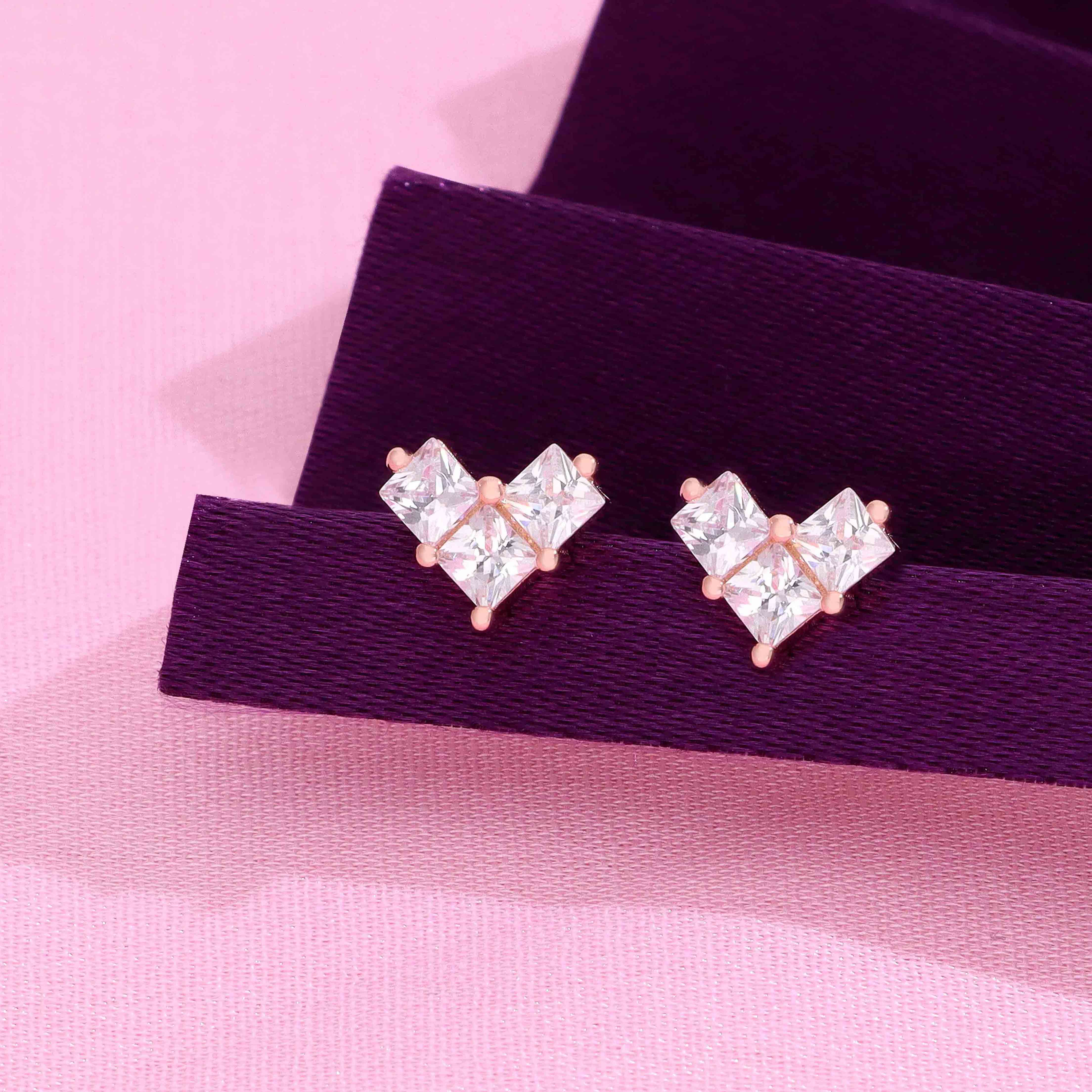 Dainty Heart-Shaped Sterling Silver Stud Earrings - Image 2