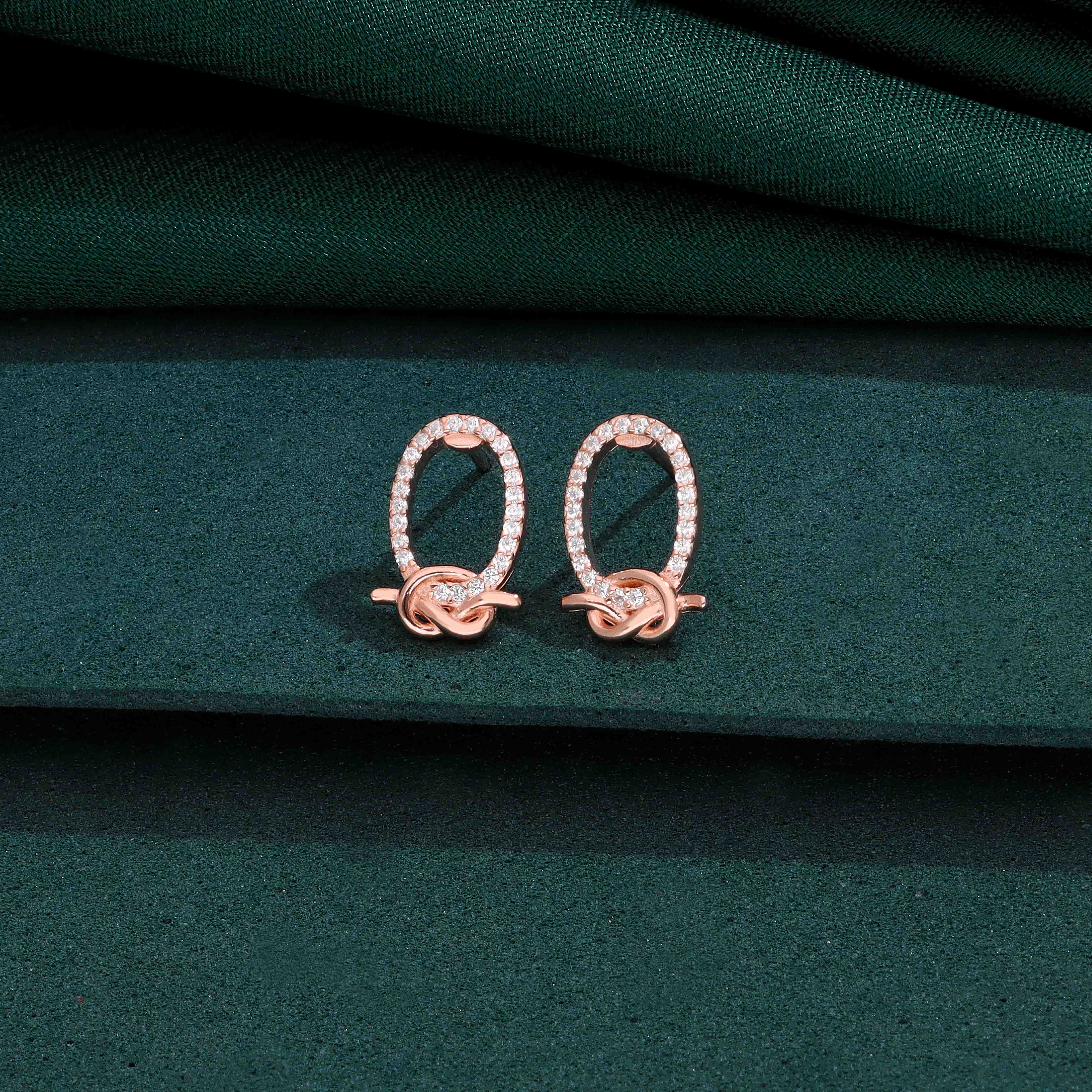 Elegant Silver Oval Knot Stud Earrings - Image 2