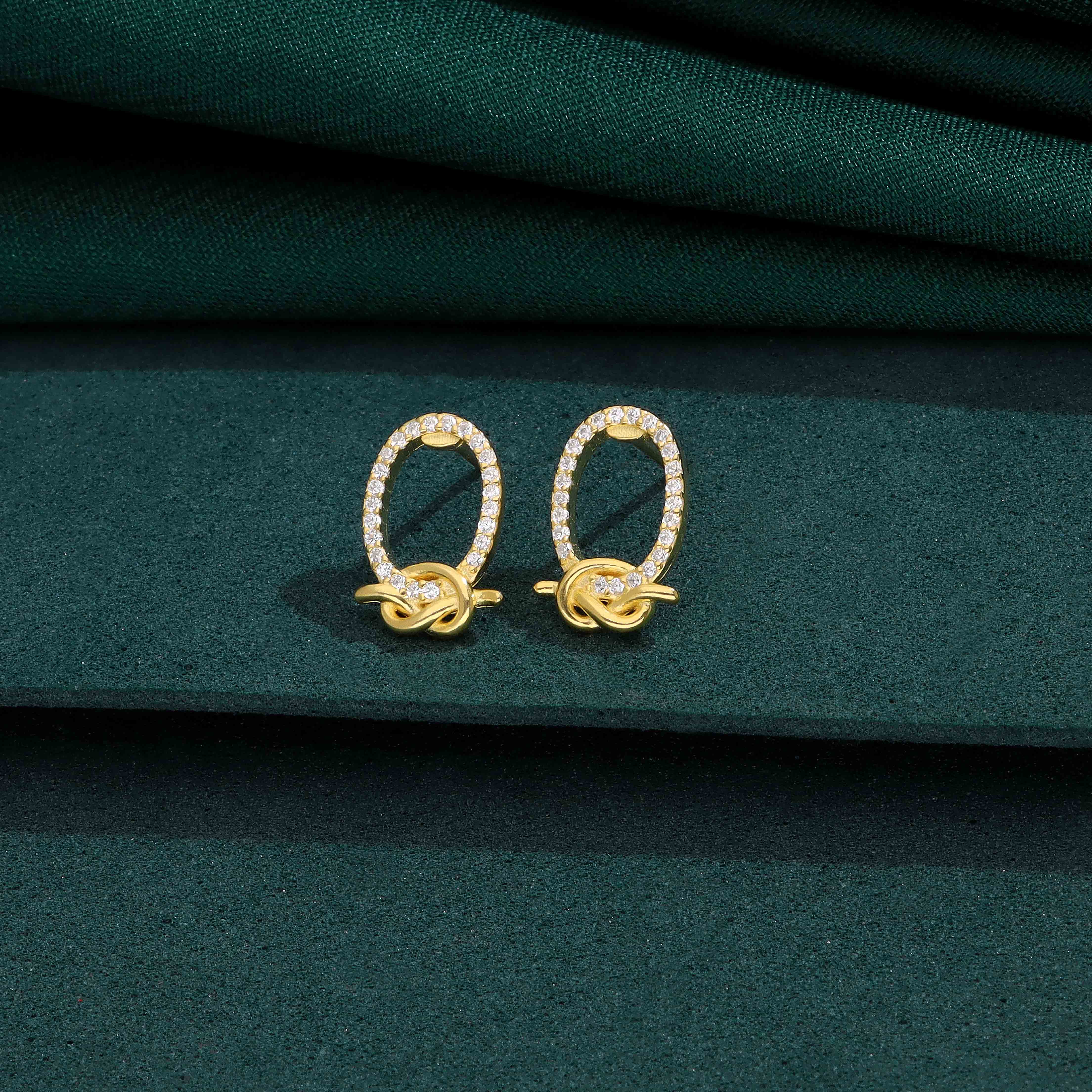 Elegant Silver Oval Knot Stud Earrings - Image 3