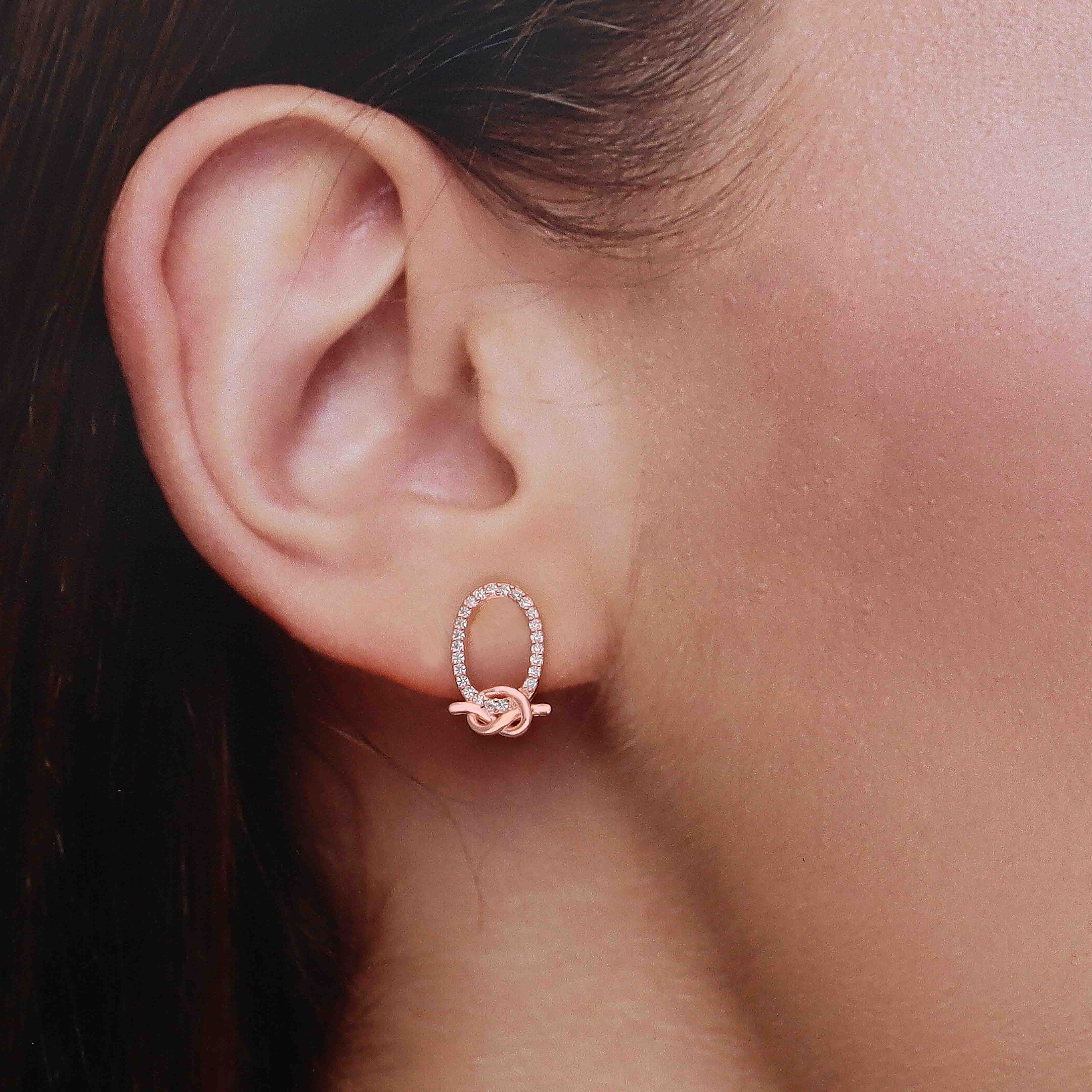 Elegant Silver Oval Knot Stud Earrings - Image 5