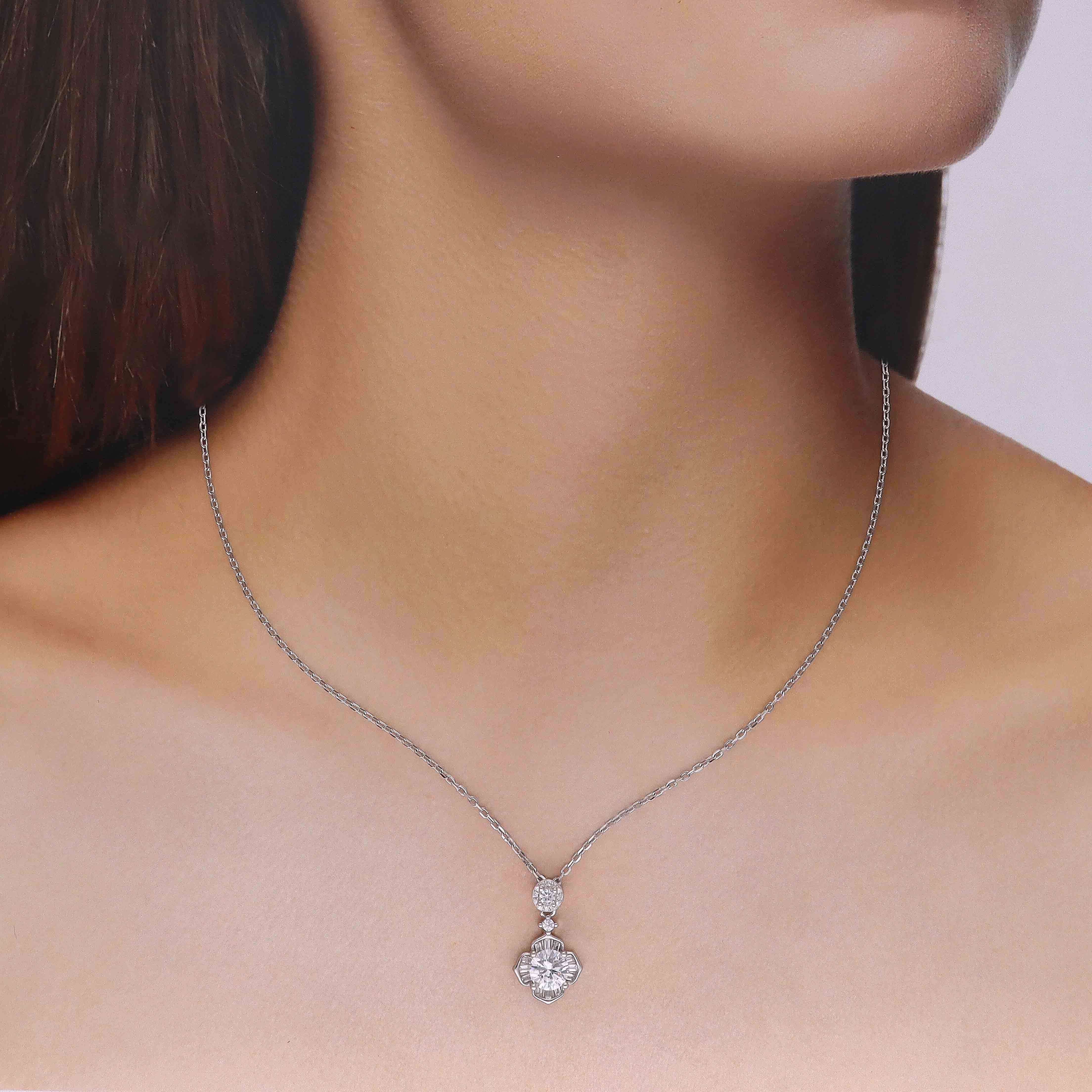 Sparkling Silver Floral Pendant with Round and Baguette Necklace - Image 3
