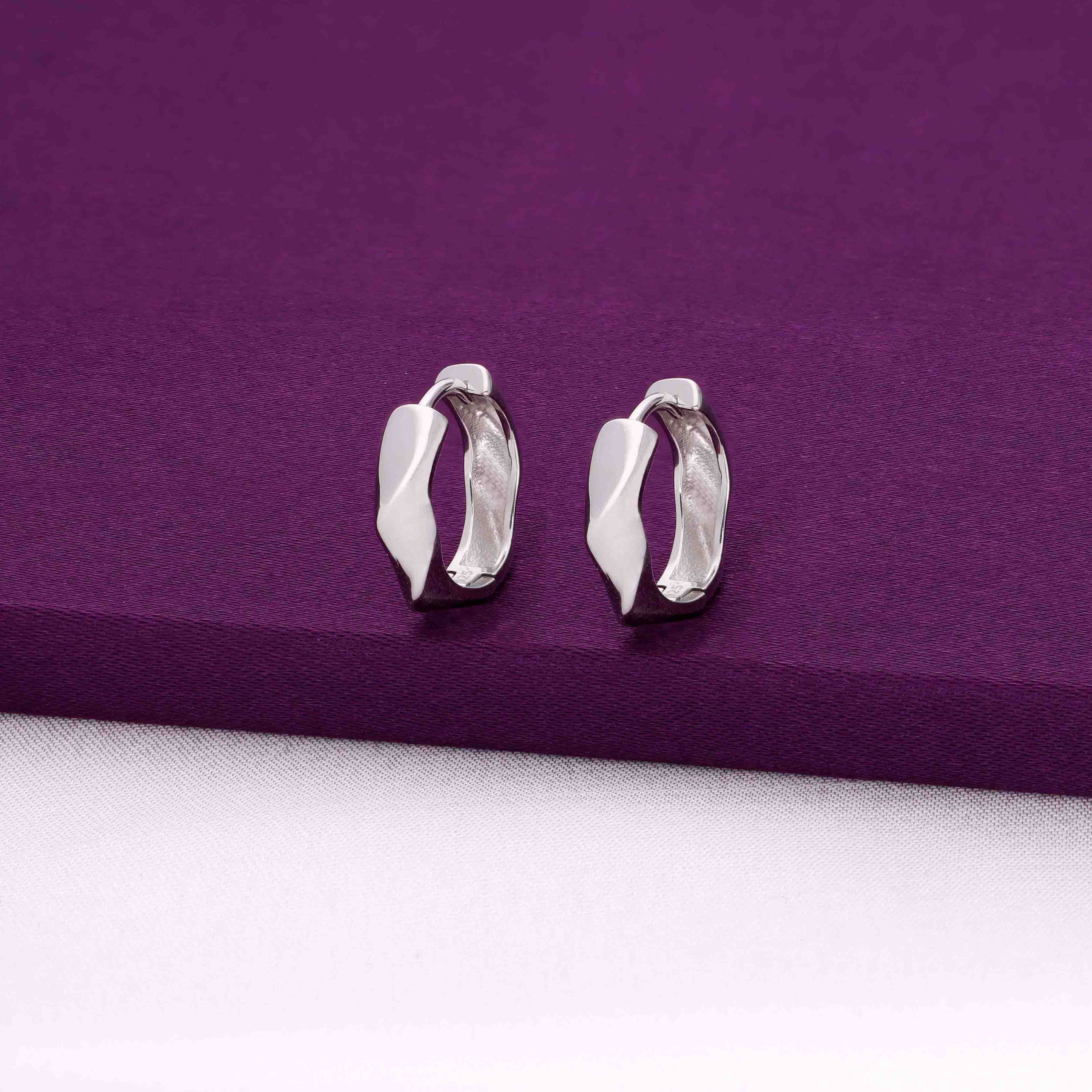 Charming Curves Knotted Silver Hoops Earrings - Image 4